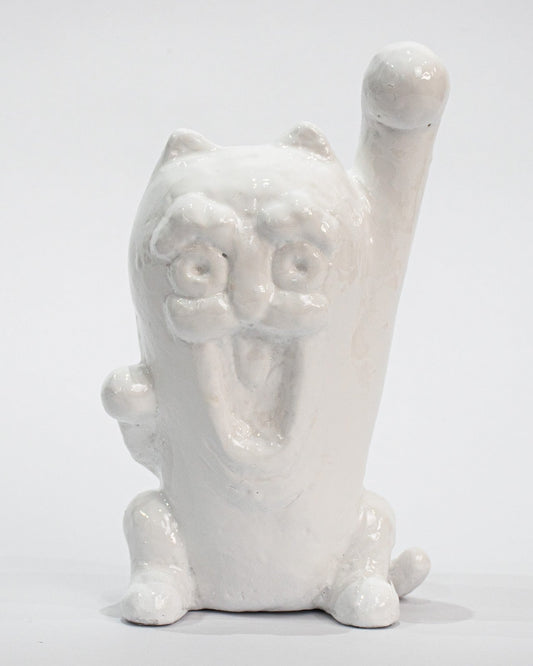A standing cat statue that continues to invite all connections