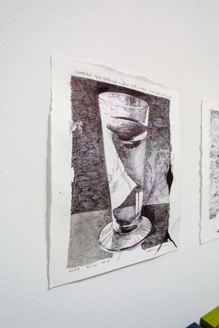 Inverted light reflected on glass and water. time goes backwards