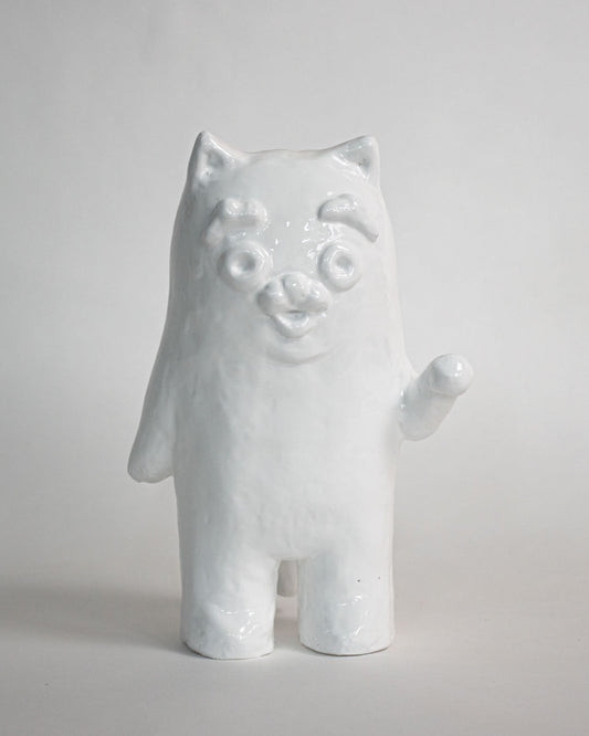As everything melts together and connects, the cat continues to beckon