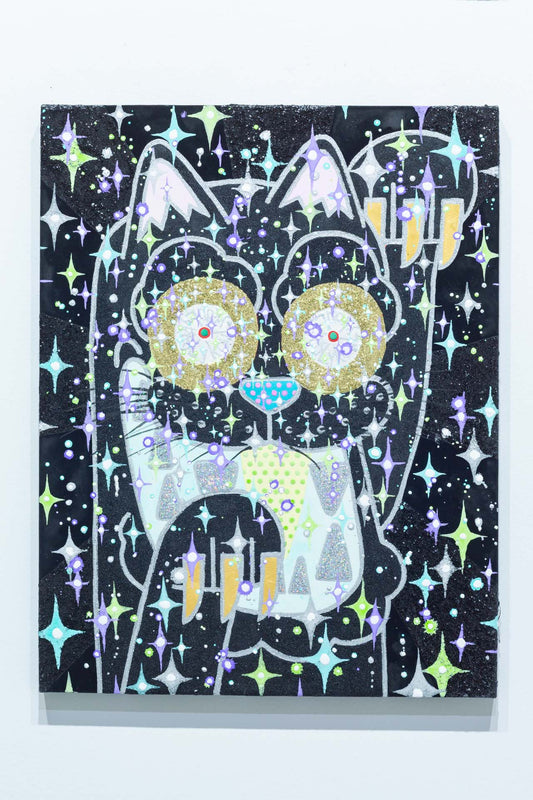 The black cat that is connected to the universe and continues to beckon