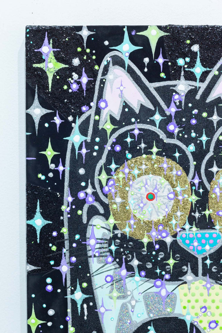 The black cat that is connected to the universe and continues to beckon