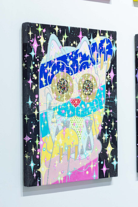 A cat that is connected to the universe and beckons