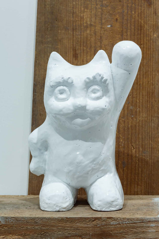 The cat continues to beckon as usual