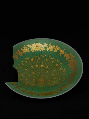 Decorative plate with gold underglaze peacock design