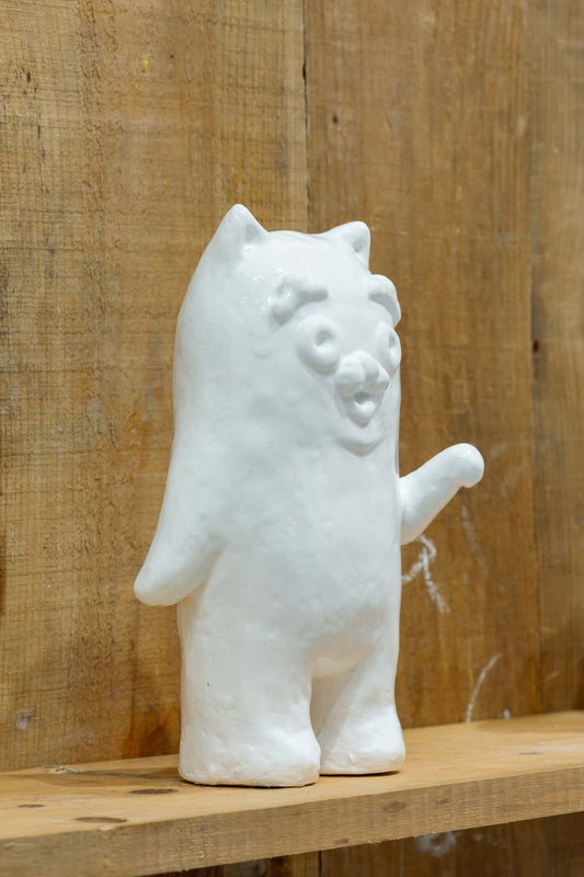 As everything melts together and connects, the cat continues to beckon